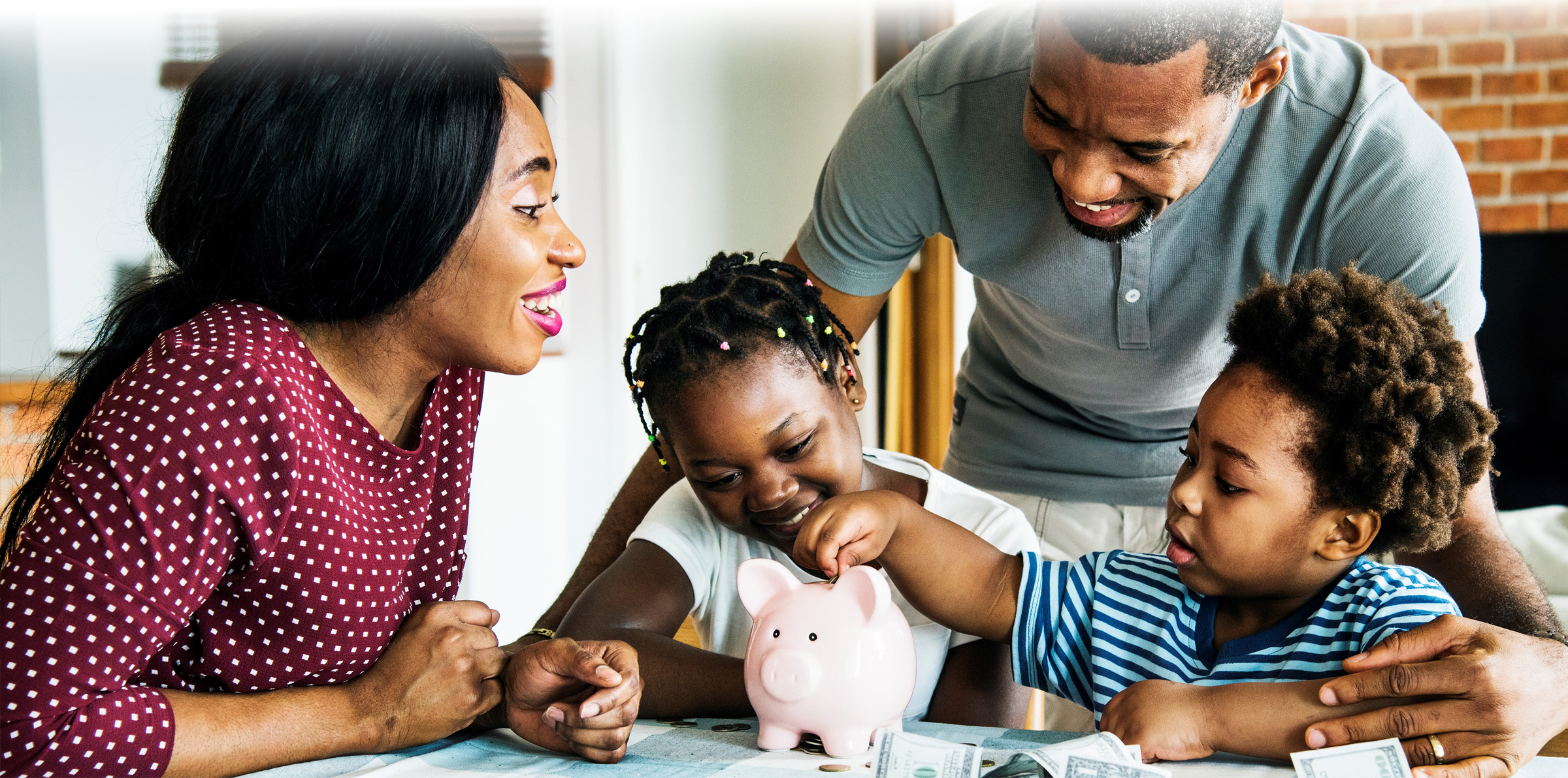 Family at dinner table with piggy bank, saving, piggy bank